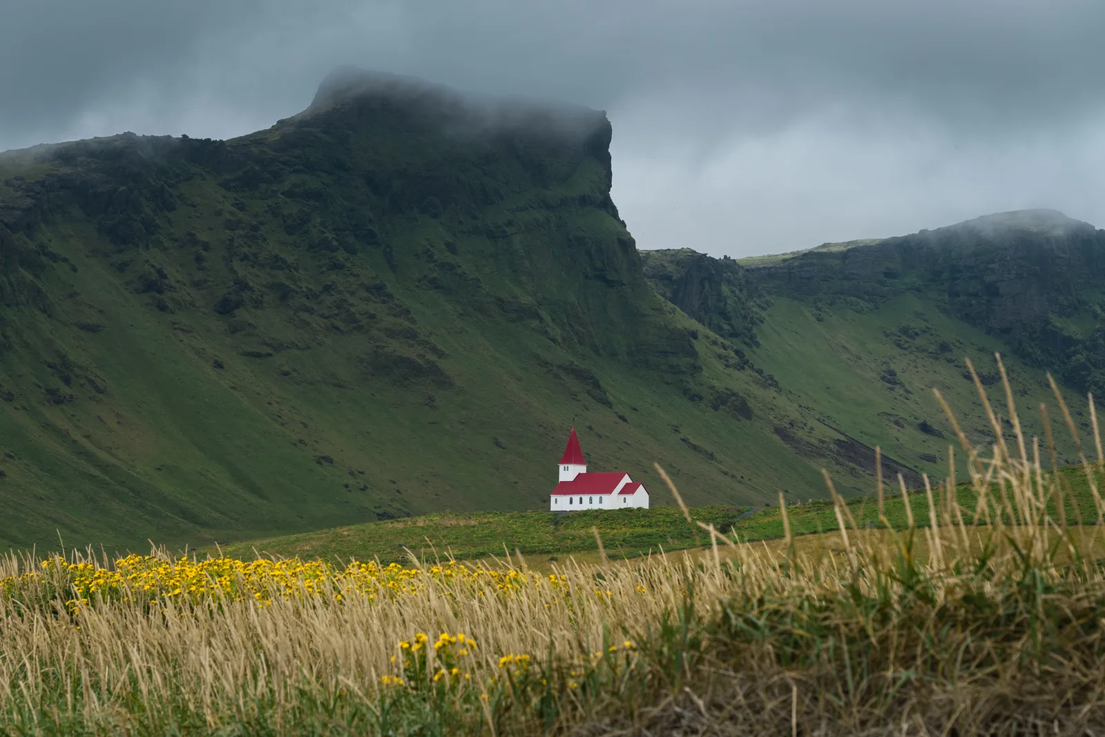 The church above the town, weather coming in.